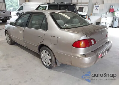 2000 Toyota Corolla Le from USA, damaged, VIN 2T1BR12E9YC264347